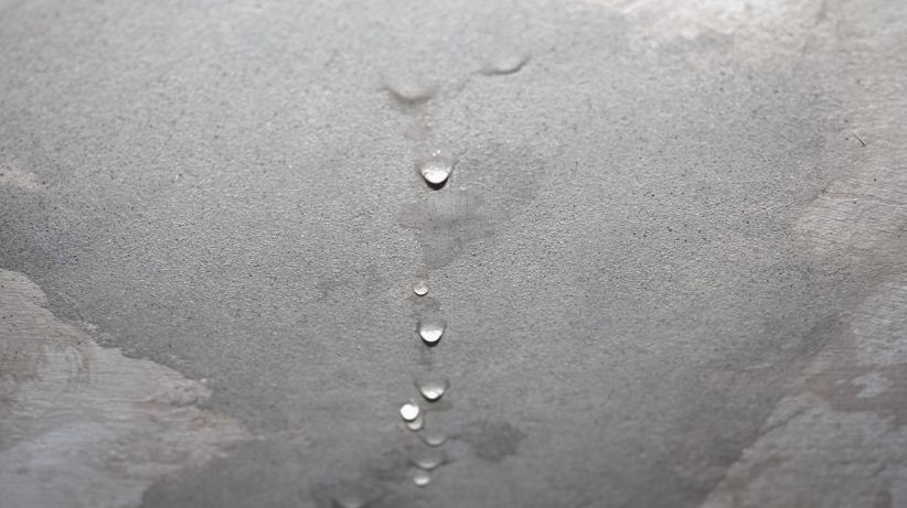 water drops on concrete